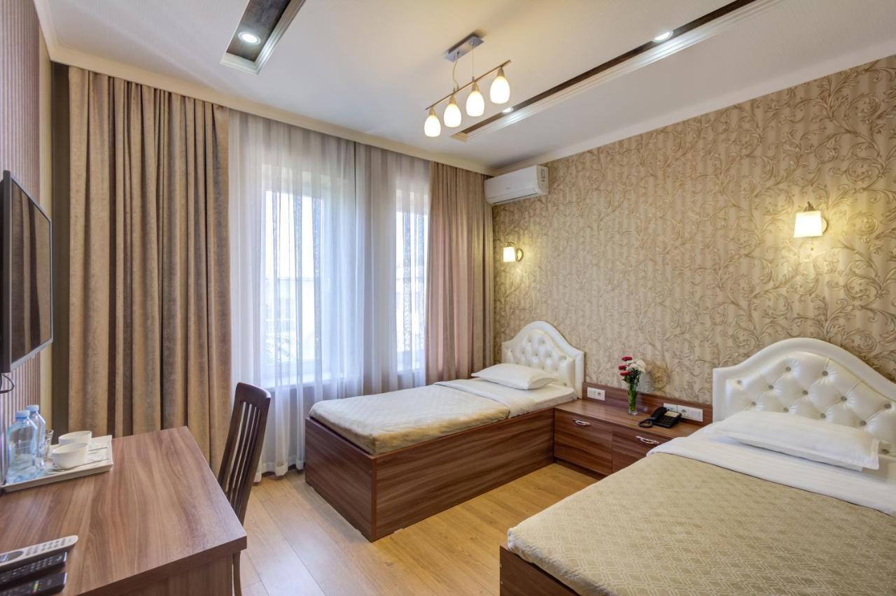 Rixon Hotel Bishkek Bagian luar foto