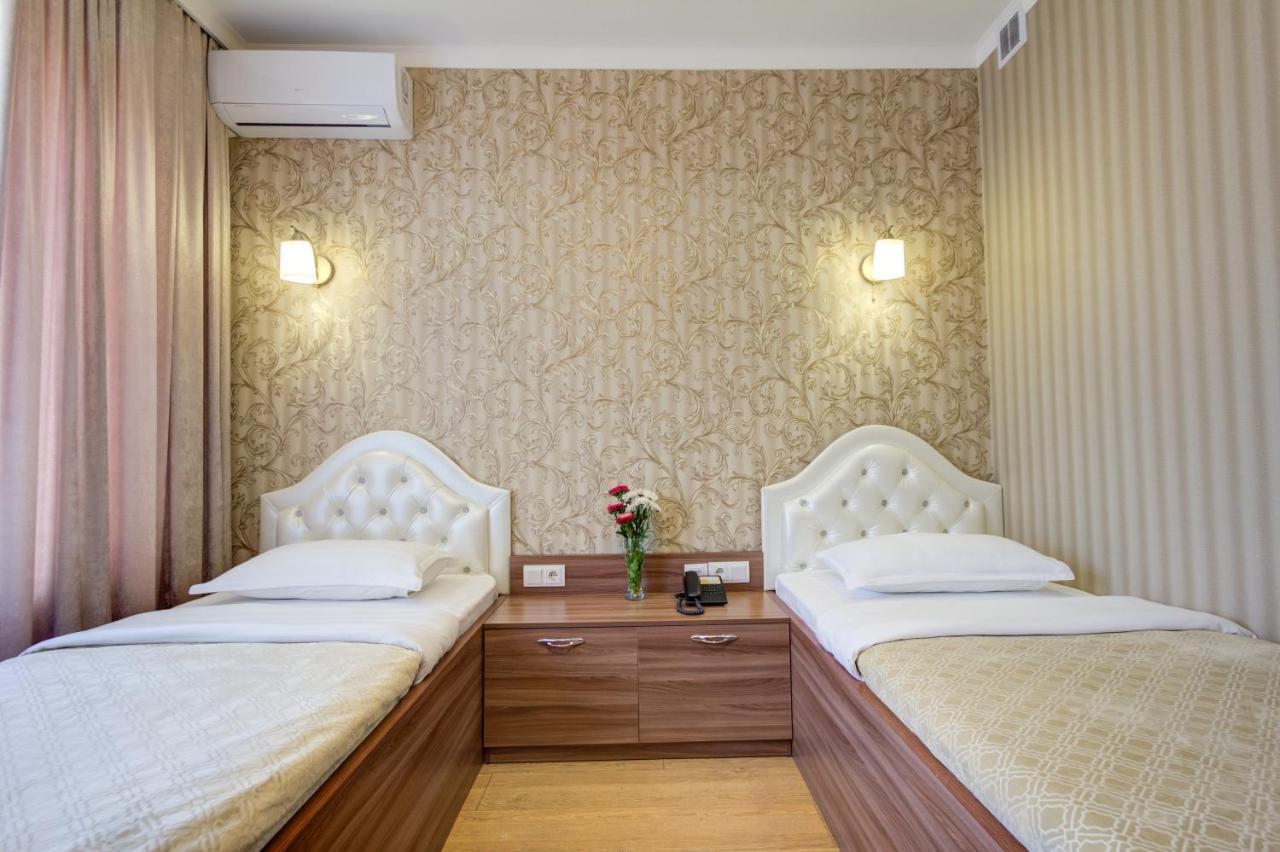 Rixon Hotel Bishkek Bagian luar foto